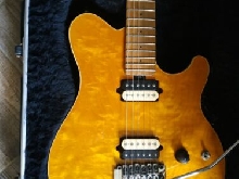 Guitare Ernie Ball Axis Music Man translucent gold 